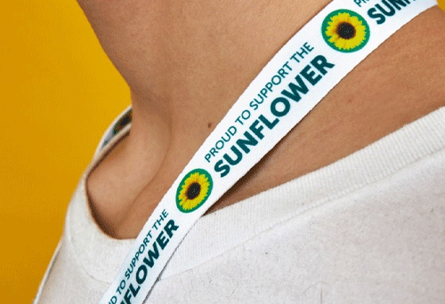 Person wearing Sunflower supporter lanyard